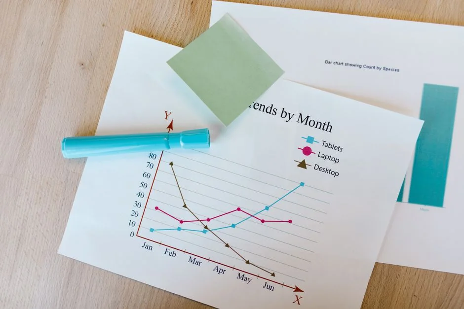 Close-up of various marketing documents on a desk, perfect for business and strategy discussions.